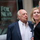 Fox News chairman Roger Ailes walks with his wife Elizabeth Tilson as they leave the News Corp building, July 19, 2016 in New York City. caption